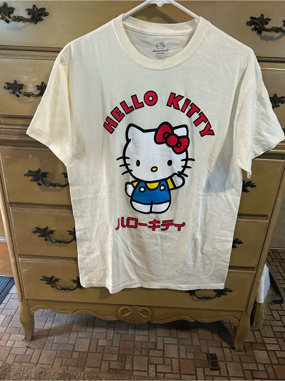 Bioworld Cream Hello Kitty Graphic Tee with Red and Blue Accents